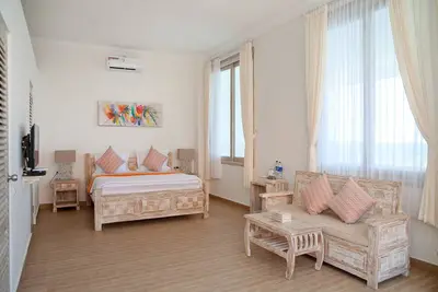 Image de Double Deluxe avec vue sur la mer et véranda privée