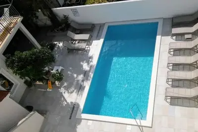 Image de Appartement familial près de la plage, piscine privée, salle de gym, parking, position centrale