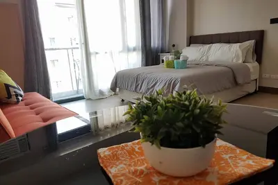 Image de Condo Homey Airport Ă Two Palm Tree Villas