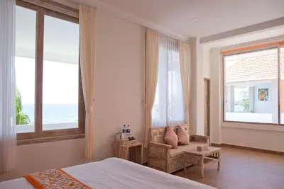 Image de Chambre Double Luxe avec baignoire vue sur la mer sur la véranda