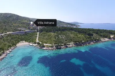 Image de Villa Adriana vous offre une expérience d'hébergement relaxante avec une belle vue sur la mer
