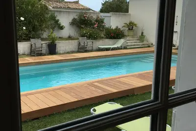 Image de Villa sur parcelle 1100m2 clos de murs endroit tres calme  Est Ouest