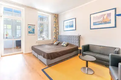 Image de Appartement 2 pièces avec cheminée, WiFi, parking et chaise de plage sur la plage