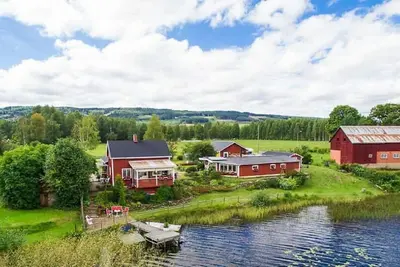 Image de Maison de rêve avec sa propre plage au bord du lac