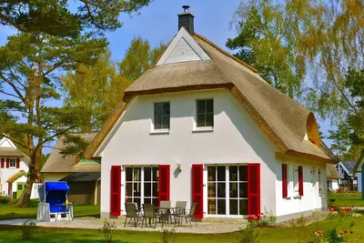 Image de Proche de la plage, calme, familial, spacieux avec sauna, cheminée, 3 téléviseurs