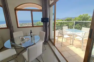 Image de Sunny penthouse with panoramic-terrace, pool and the best sea view in Nerja