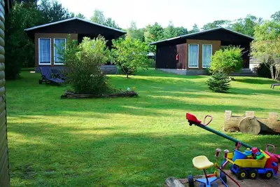 Image de Maison de vacances Stechlinsee 45m² jusqu'à 2 + 2 personnes à Neuglobsow Mecklenburger Seenpl