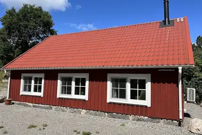 Image de Maison de vacances \"Gamla Smedja\", KlasamĂĄla, SmĂĄland - ferme au bord du lac Ă…snen. . .