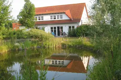 Image de Maison de vacances joliment meublée \/ Rügen \/ Garz \/ Zudar \/ Parc résidentiel Losentitz