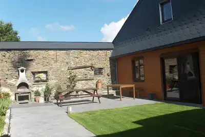 Image de Ferme rénovée avec sauna, bain à bulles et  5 chambres près de Bouillon