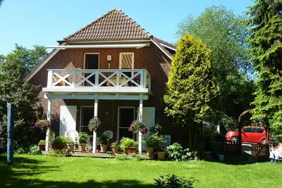 Image de Appartement de vacances avec jardin pour 4 personnes, chiens admis