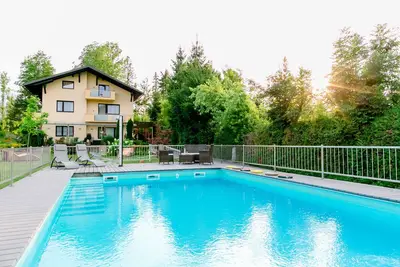 Image de Haus am Wald * Appartements avec piscine * Enfants bienvenus * Plage de baignade * Faaker See *