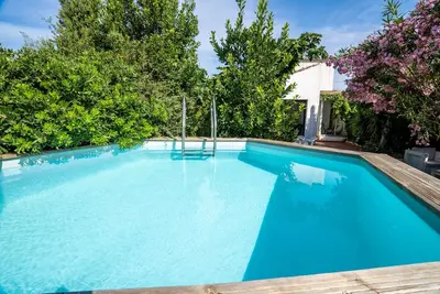Image de Maison neuve, piscine, 5 mn plages, vue superbe sur l'étang, 6/8 pers