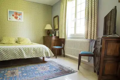 Image de Chambre bleue : une suite confortable au coeur d'un domaine périgourdin