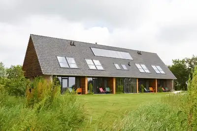 Image de Grande maison de vacances adaptée aux enfants près de Lauwersmeer et de la mer des Wadden