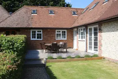 Image de Le chalet à Flintstone Cottages près de Chichester Goodwood 6\/8