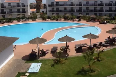 Image de Piscine supérieure avec 1 lit face à l'appartement avec balcon sur Dunas Beach Resort and Spa