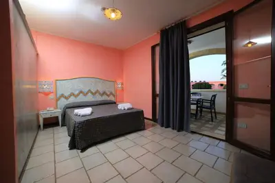 Image de Punta Grossa Village - Chambre Familiale au premier étage