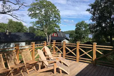 Image de Cottage avec vue sur l'océan sur l'île de Rindö à 45 min de la ville