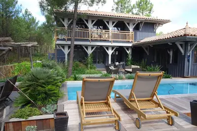 Image de Superbe villa en bois, piscine chauffée, spa, tout confort, entre océan et bassin