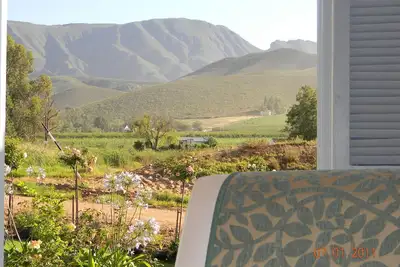 Image de Cape Winelands cottage 90m2 avec de belles vues sur les vignes, les montagnes et l'orcha