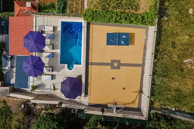 Image de Maison confortable avec piscine privée chauffée et vue sur la mer