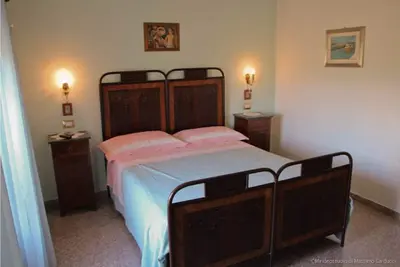 Image de Montefalco Guest House - Chambre verte