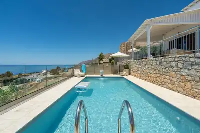 Image de ALÍA, modern house in village, magnificent sea and coastal views!