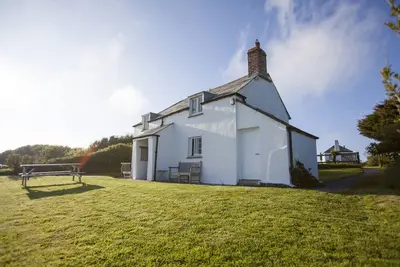 Image de Un chalet Cornish Ferme traditionnelle avec la Côte vues spectaculaires