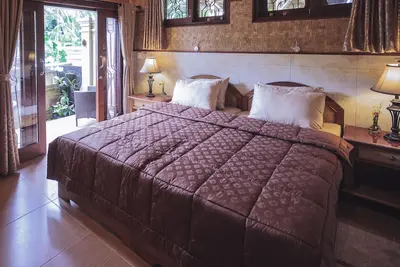 Image de Tranquille, Luxe Sawo Appartement 1 Ă Murni's Houses and Spa, Ubud, Bali