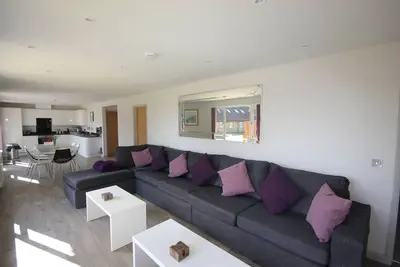 Image de Le Lodge At Flintstone Cottages près de Chichester et Goodwood pour 6/8 personnes
