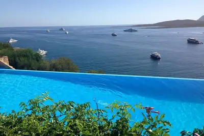 Image de Superbe apt-villa avec vue sur la mer et jardin privé et piscine de la station