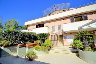 Image de Casa Pesca: Un appartement moderne et charmant situé à quelques pas de la plage de sable.