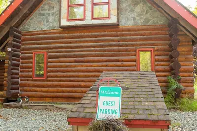 Image de Cabane en rondins d'Alaska avec bain Ă remous