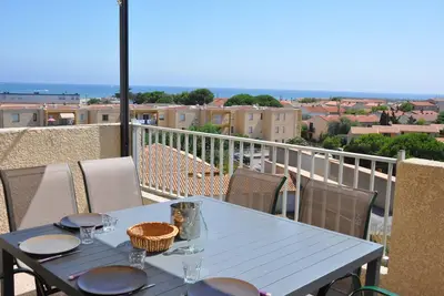 Image de Pavillon avec terrasse vue mer et piscine dans résidence