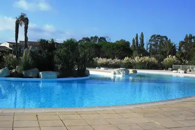 Image de Appartement pour 4 personnes avec piscine et accès direct à la plage aux Marines de Gassin