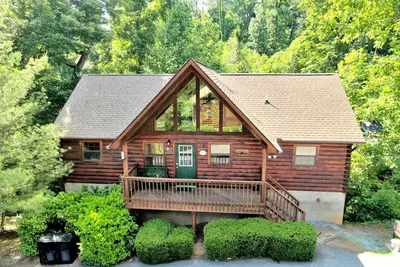Image de Grande cabine 4 Br 1 Mille De Dollywood! Jacuzzi, bain à remous et accès à la piscine