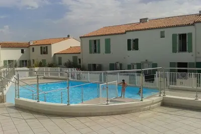 Image de Charmant plain pied *** avec courette, piscine, Wifi