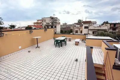 Image de Appartement Ermes C: Un appartement confortable situé à une courte distance de la plage.