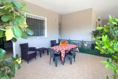 Image de Appartement neuf avec grand patio couvert et parking confortable en bord de mer