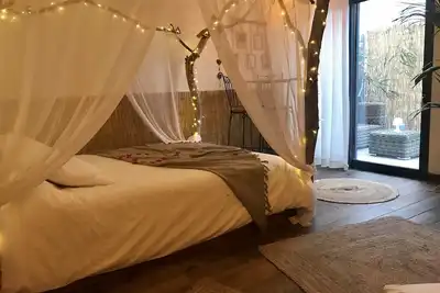 Image de O5sens chambre paillote avec jacuzzi