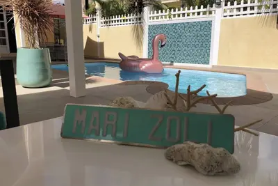 Image de Mari Zoli : à 10 min \" en tongues\" de la plage de Pereybere