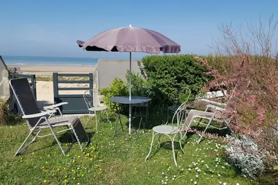 Image de front de mer superbe appartement 3ch, jardin privatif ; accès direct à la plage