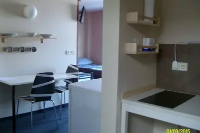 Image de Vivre dans des appartements modernes avec un café culturel, cuisine végétarienne