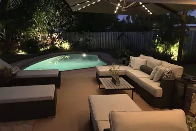 Image de Palm Beach Gardens Home avec piscine privée