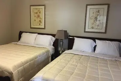 Image de Condo exécutif 2 chambres \/ 2 salles de bain dans les bois