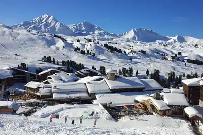Image de Belle Plagne, cosy 2 pces, skis aux pieds / ménage et parking couvert inclus! ! !