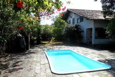 Image de Grande maison avec piscine à Praia do Bosque - 5 chambres