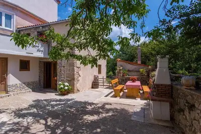 Image de Maison de vacances avec terrasse et dans un endroit calme