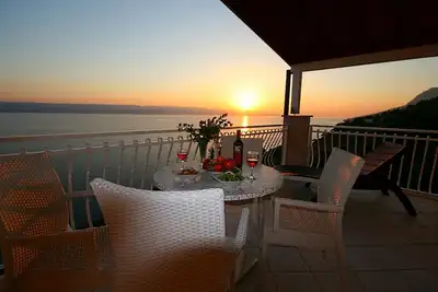 Image de Villa Mandolina située juste au-dessus de la plage privée et avec la meilleure vue sur la mer